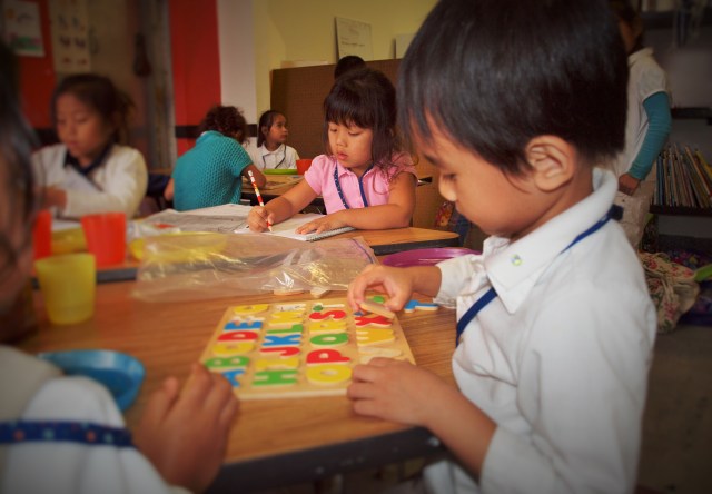 Kindergartners work on homework, have snacks, build puzzles and color during Our Bridge’s first hour. The program runs 3-6 p.m. Monday-Friday. 